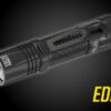 The Nitecore EDC33 is an EDC flashlight that boasts an amazing brightness and throw, making it an ideal choice for everyday carry. Featuring the innovative NiteLab UHi 20 MAX LED, the EDC33 delivers a powerful 4000 lumen output and an impressive throw of 492 yards. Fully press the tail switch to power the light on or off. While the light is on, perform a half-press to cycle through four different brightness levels.
